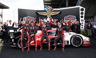 The No. 6 Porsche team celebrates its Indianapolis victory.